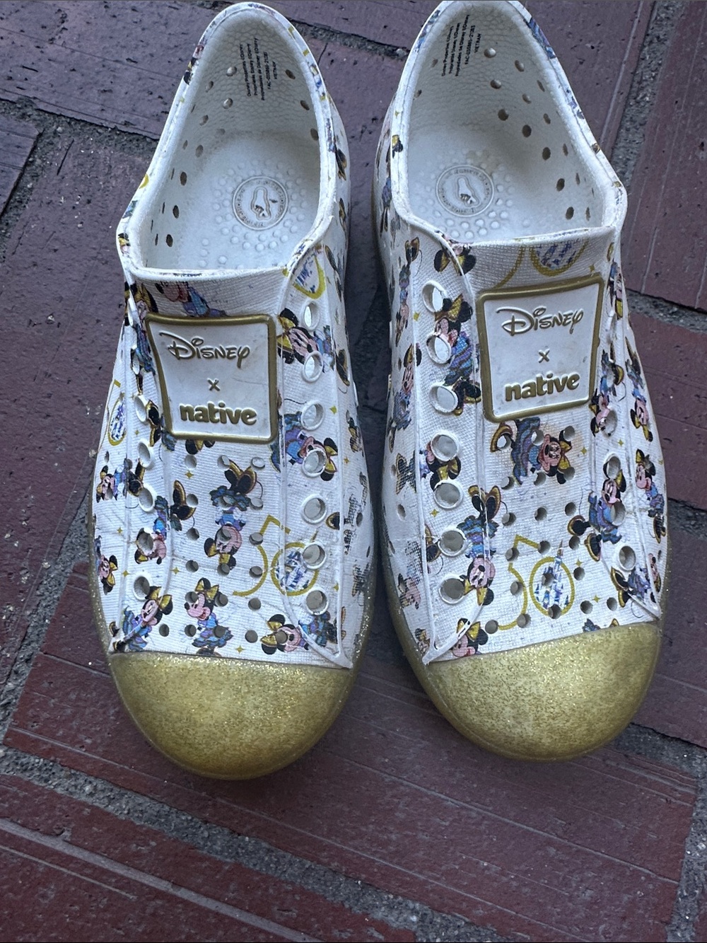 Native x Disney collab Minnie Mouse White & Gold Slip-On Shoes